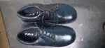 Safety shoe of size 10 , of colour -black isi marked shoe.