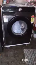 Samsung washing machine with 7.5 kg capacity and front load.