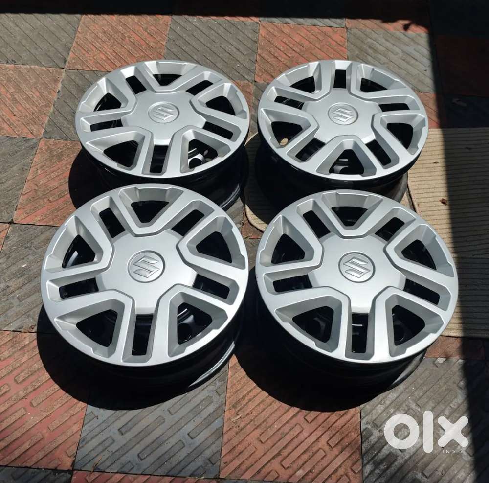 Brand new Brezza Wheel Rim and Cap.