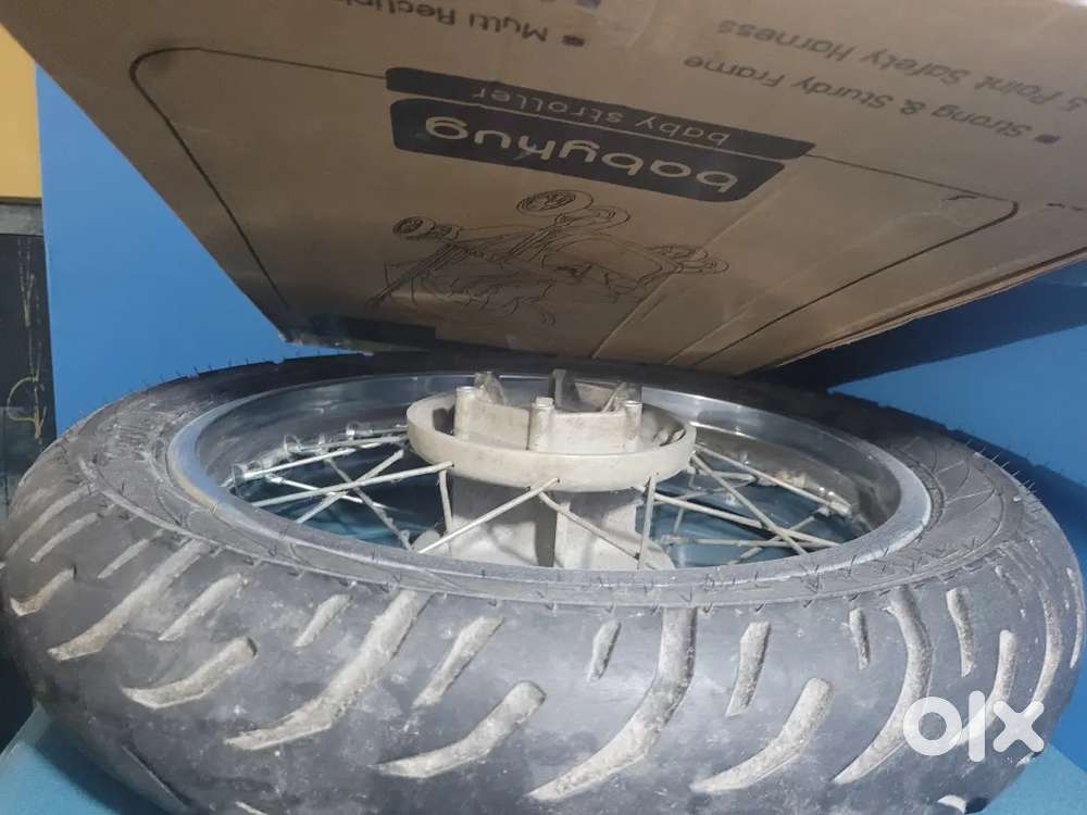Classic reborn rear spoke rim with ceat tyres.