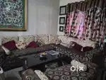 Sofa with a couch, foldable bed, almirah