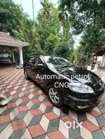 Toyota Corolla Limited AT Petrol, 2004, CNG & Hybrids