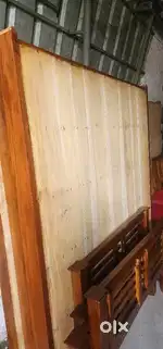 Wooden queen size cots available