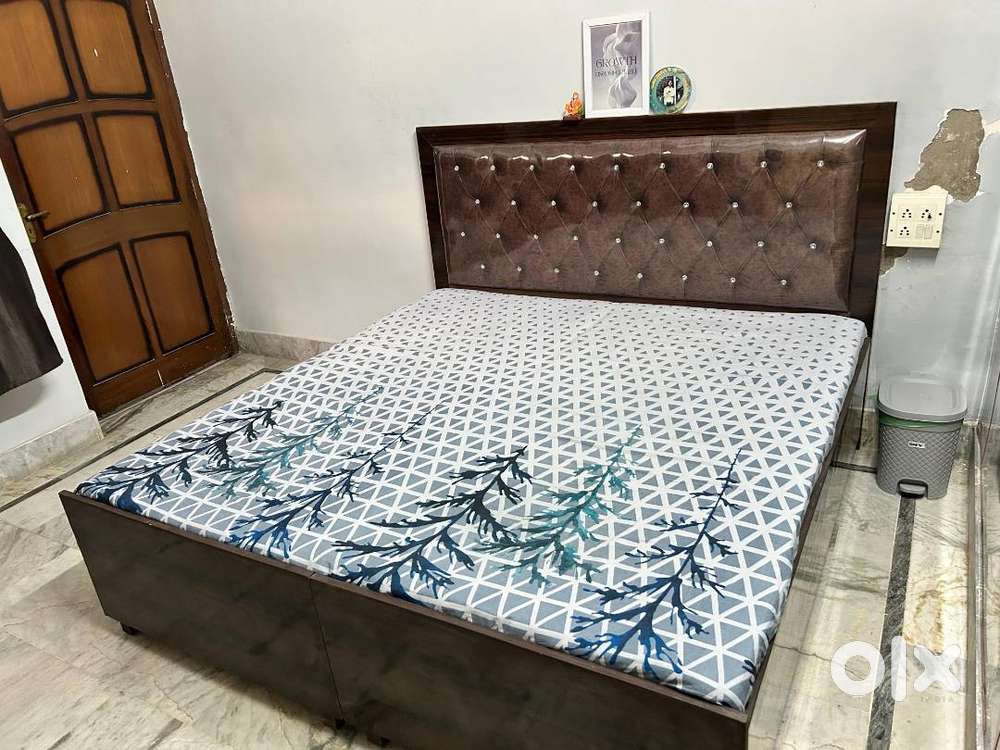Newly made double bed Brown