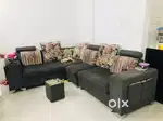 L shaped sofa with 4 small tables