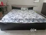 King size wooden bed