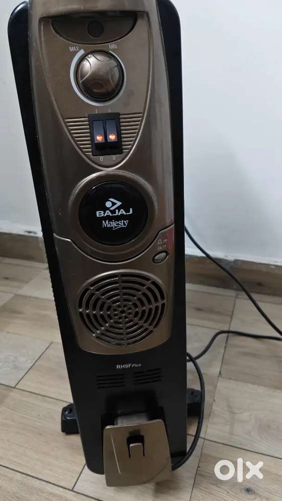 BajajMajesty RH 9F Plus 9 Fin Oil Filled radiator Room Heater With Fan