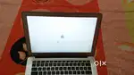 13.5-inch Apple MacBook Air with bill