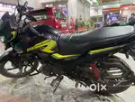 Sp 125 black green colour