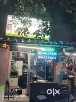 Female staff for computer and mobile shop