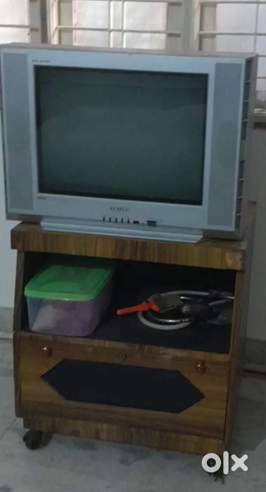 Tv with wooden stand