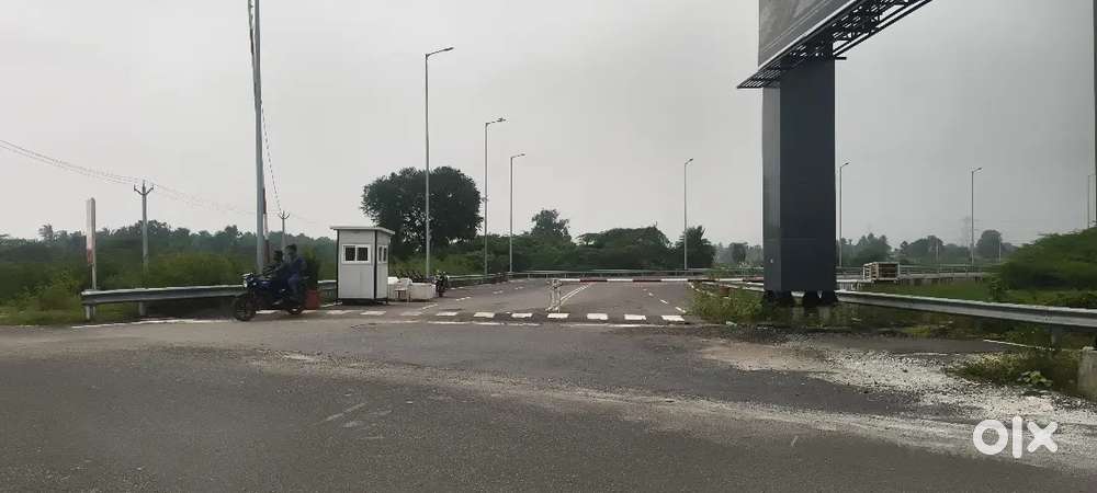 THIRUVALLUR HIGHWAY (ADHANI GODOWN NEAR COMMERCIAL LAND FOR SALE.
