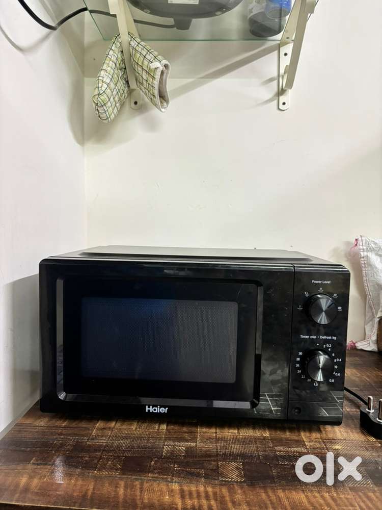New haier 15 days old microwave 1 year warranty with box