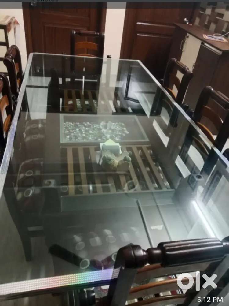SIX SEATER GLASS TOP DINING TABLE