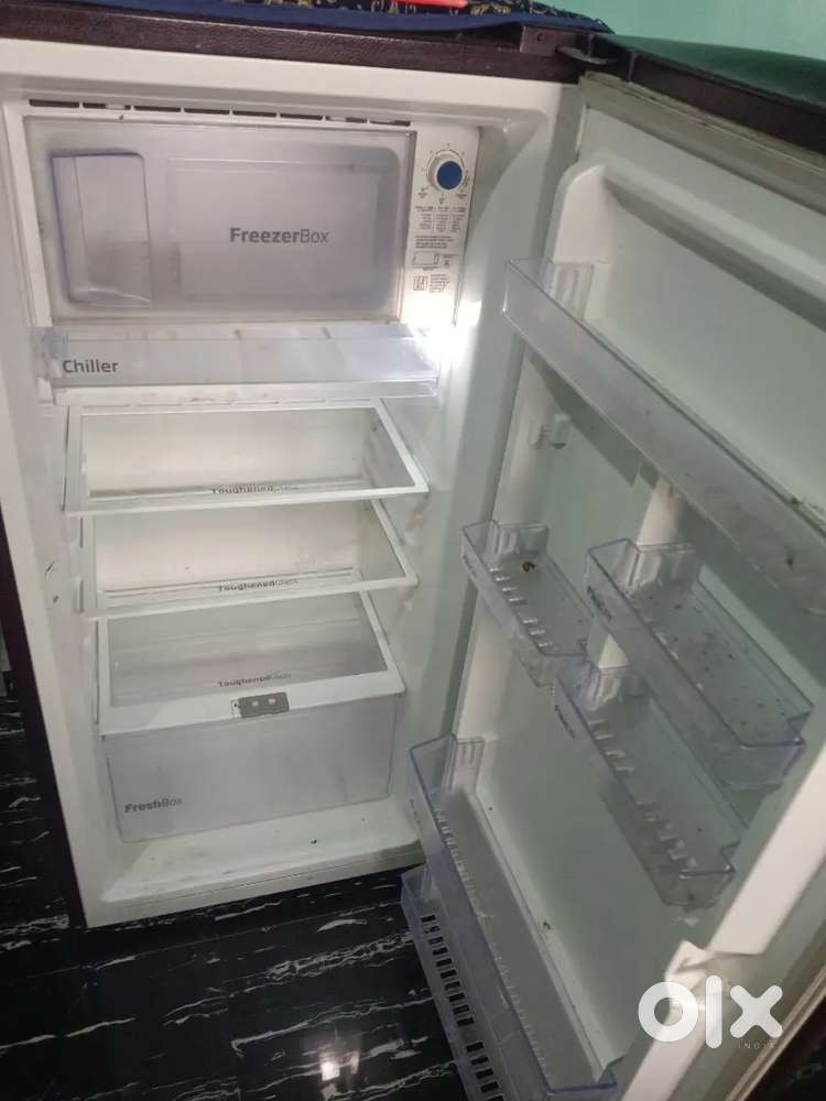 2years old fridge want to sell in 9000 in good condition single door