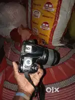 Nikon D3100 or D40 and lens. Best condition