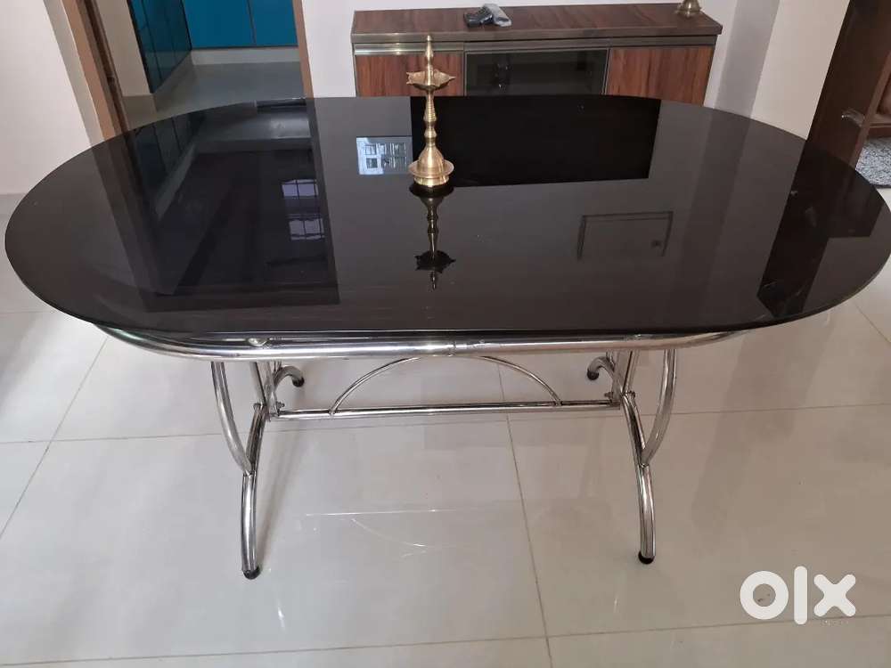 Glass top dining table