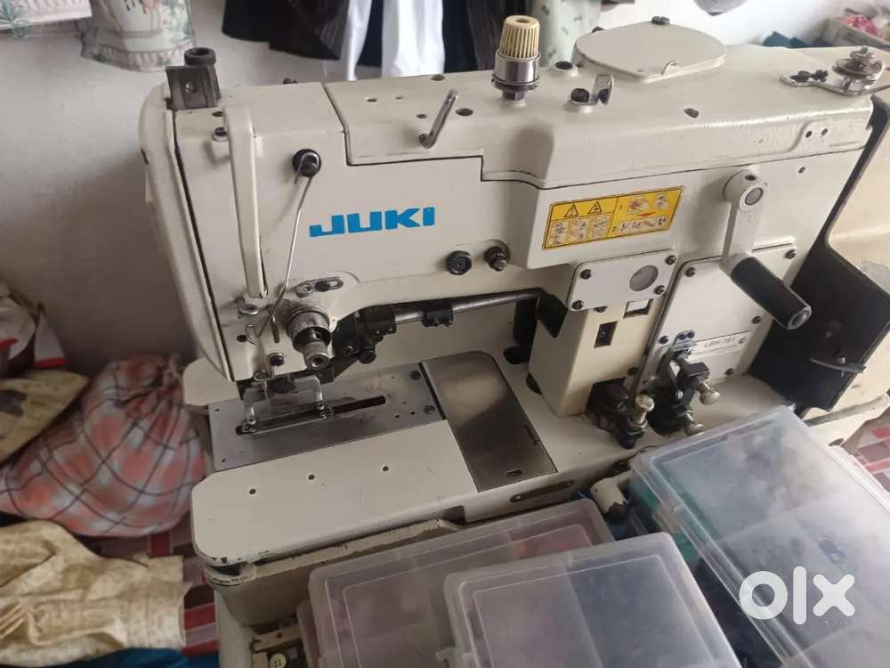 Juki kaj Button machine