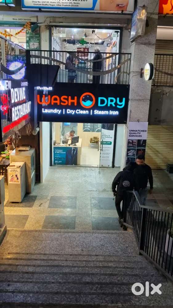 Press man and washer with machine , store manager, receptionist