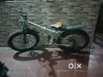 21 gear folding bycycle with shock up and middle suspension cylender