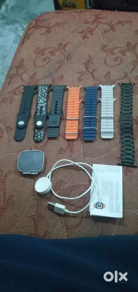 Ultra watch with 7 different type of straps and a metallic strap