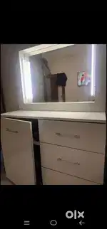 Strong and durable white dressing table with lights installed