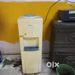 Water dispenser with fridge working condition.