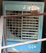 Cooler with crompton motor and stand having solid wheels