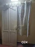 one wooden door made of honne wood , heavily used, in good condition