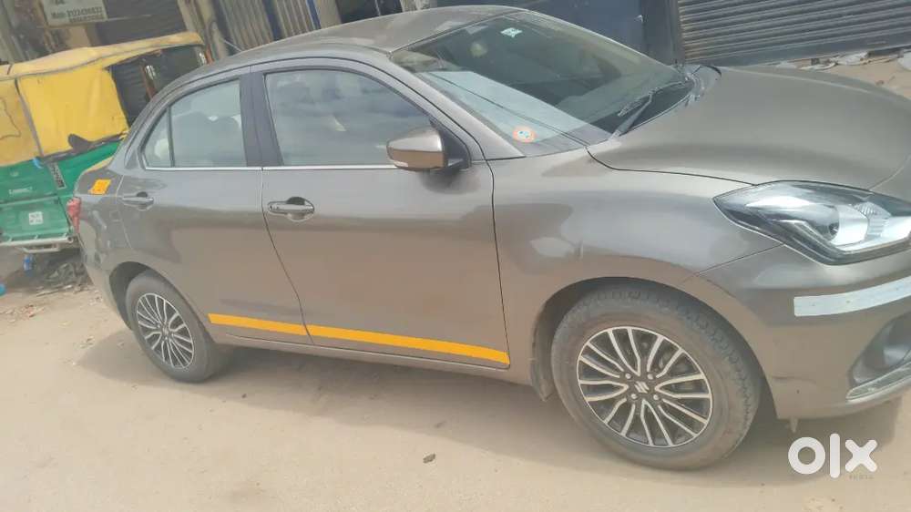 Maruti Swift Dzire ZXi Plus top and wearing first party ownersgl