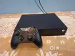 X BOX ONE X GAMING CONSOLE