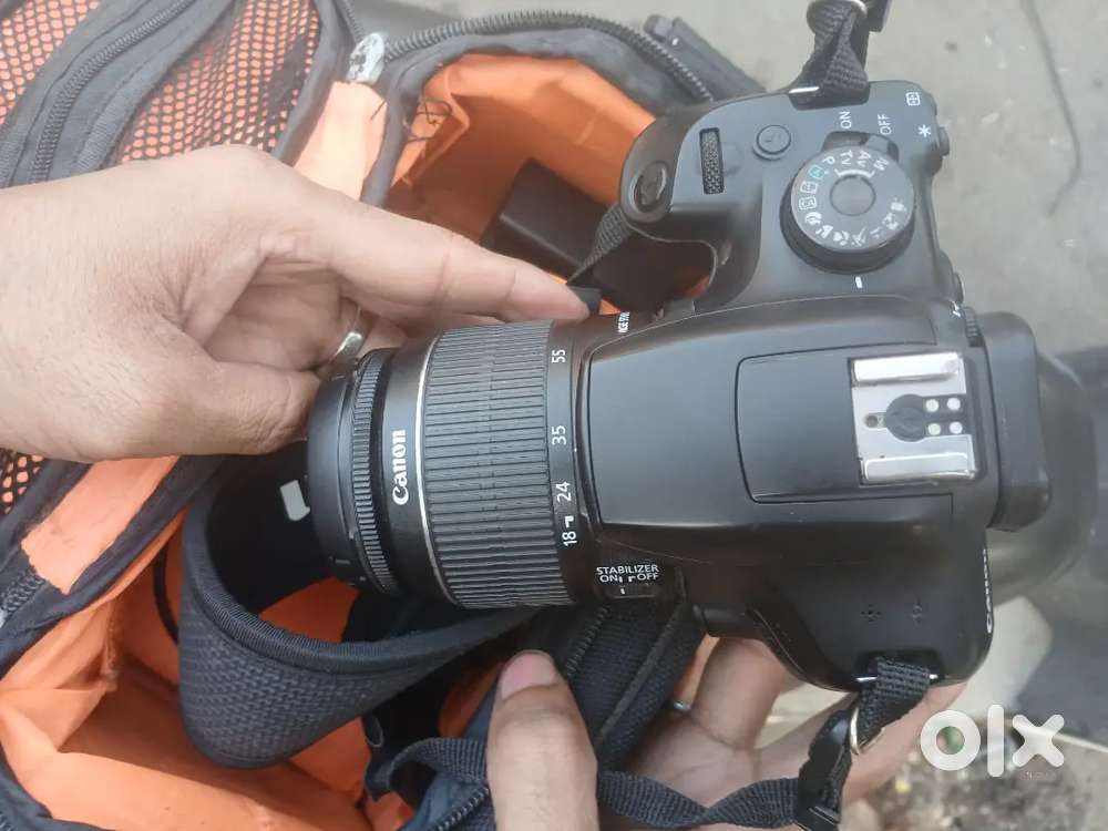 Dslr 1500d camera with lens and battery