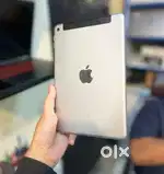 IPAD MINI 4 128GB STORAGE WIFI + CELLULAR CONDITION GOOD WITH ADAPTOR