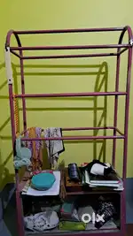 Cloth hanging rack with bottom storage space