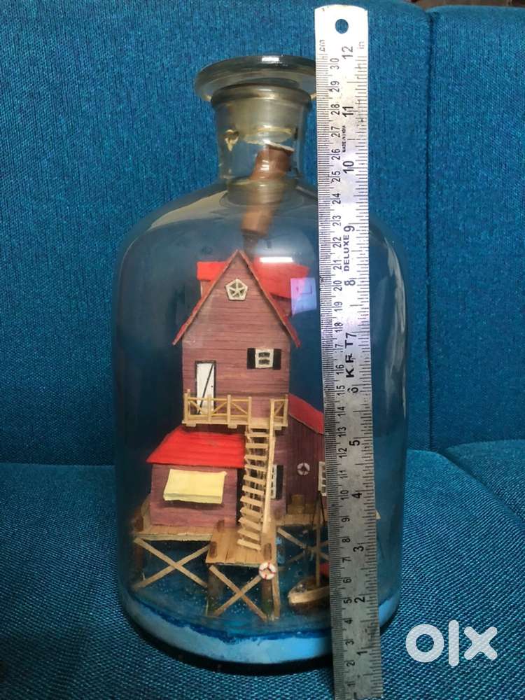 Miniature art pieces inside the bottle