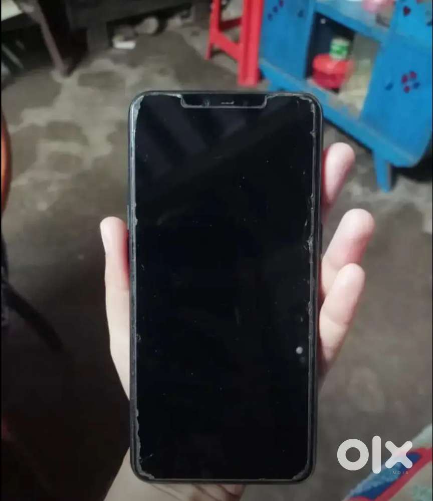 Realme C1 phone with back cover and charger