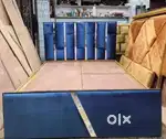 Queen size bed with blue and golden finish in STARF FURNITURE