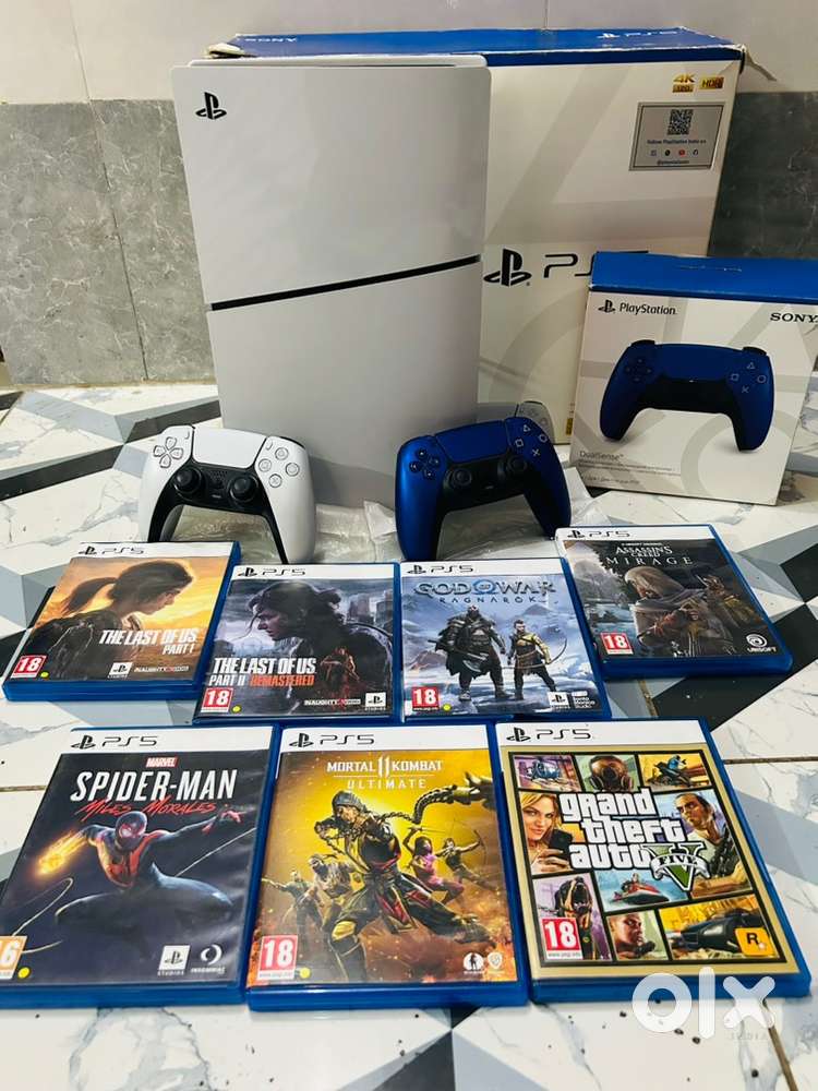 1 Yr old PS5 + 2 Remotes + 7 Games + Bill & Box Available