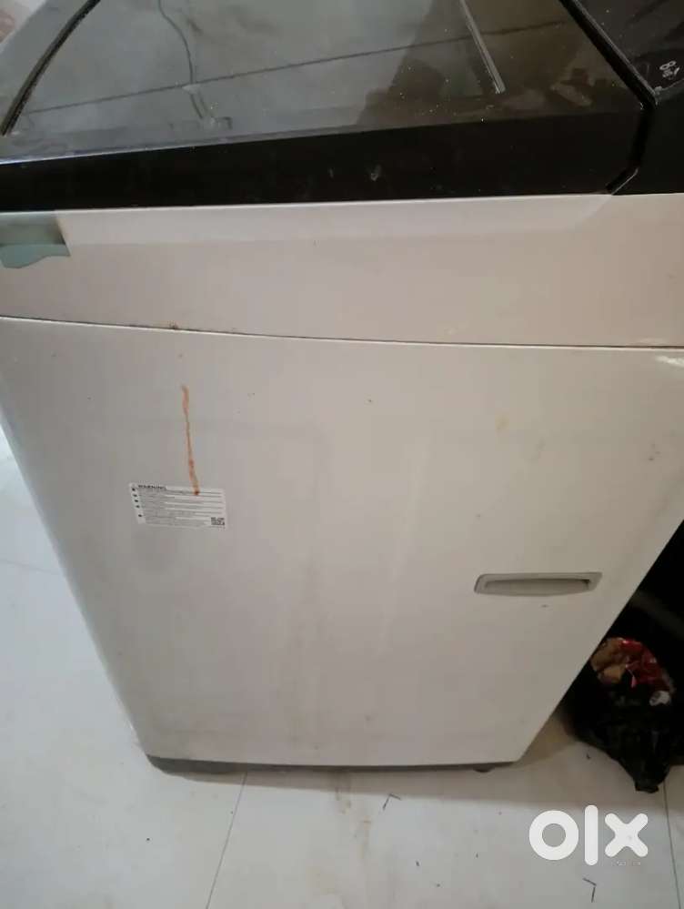 8 kg top load samsung fully automatic washing machine with five stars.