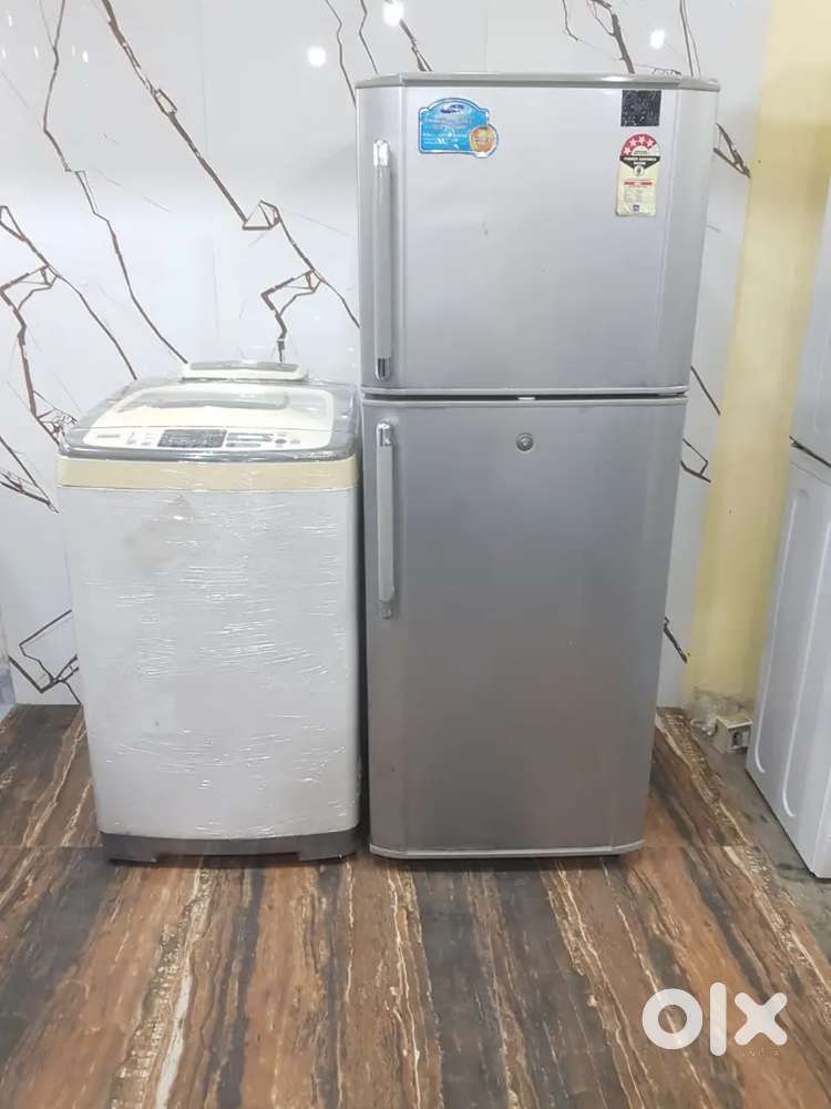 Samsung double door refrigerator and Samsung top load washing machine
