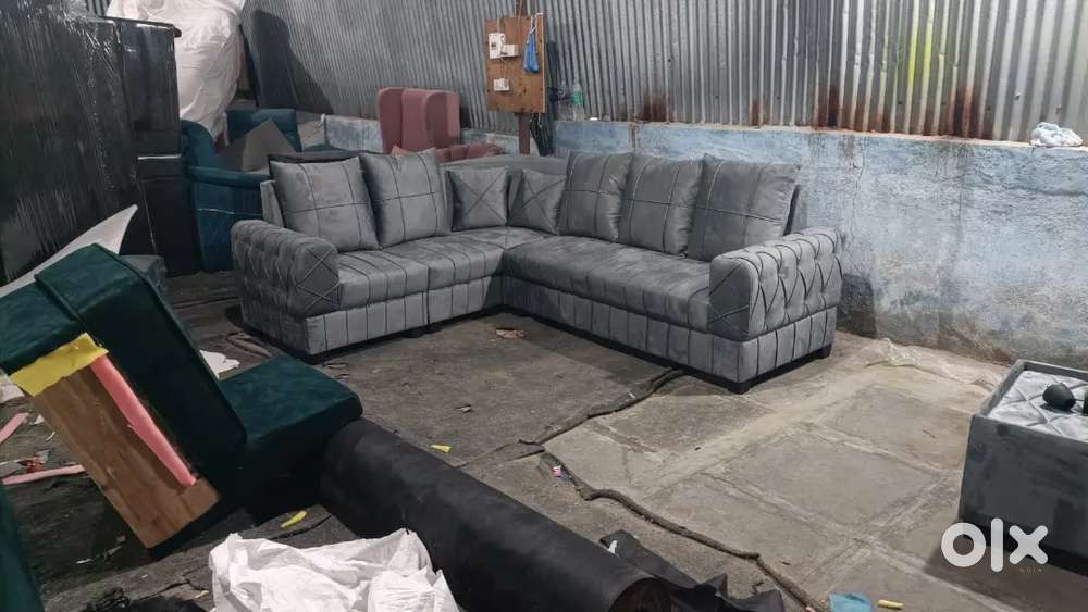 Button model L shape Sofa available in Starf Furniture