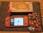 Nintendo Switch Lite With MarioKart Deluxe Coral Handheld Console Used