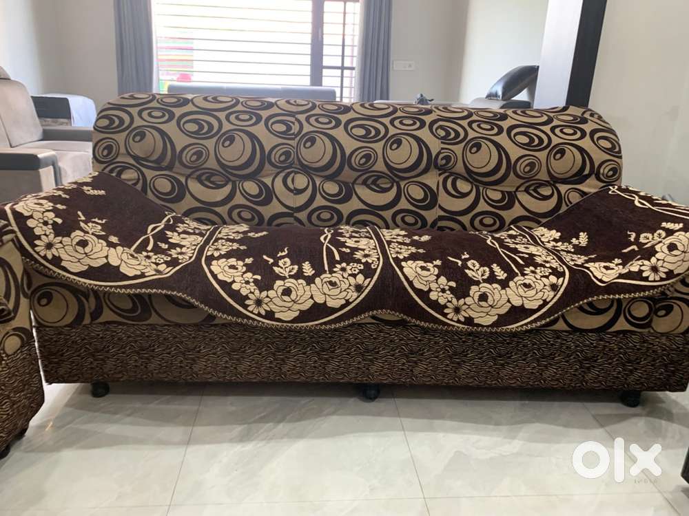 5 seater sofa with glass table