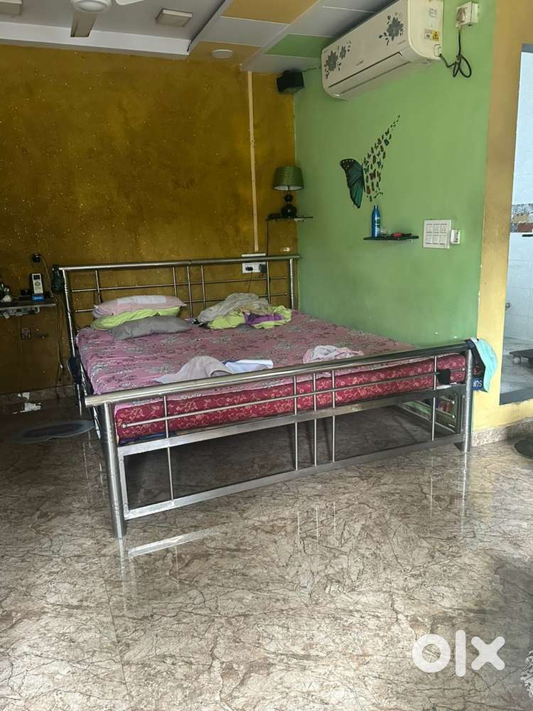 Stainless steel framed bed. 7*6 only bed selling . No matress for sale