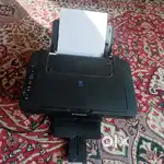 Canon pixma E410 printer and scanner with 100+ A4 sheets free