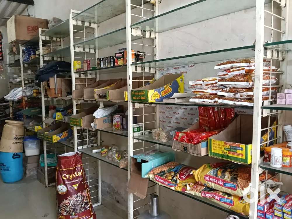 Steel and glass mounted cosmetic display rack for showrooms and shops