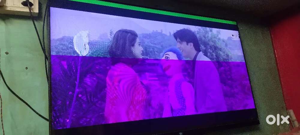 MI LED TV{55} inchi  black colour