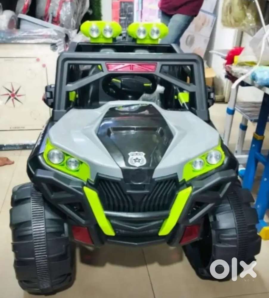 Kids car 2   (4x4 battery remote control 6-month-use  Nice condition