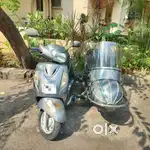 Parsi owned 2013 Suzuki Access with sidecar (metallic grey)