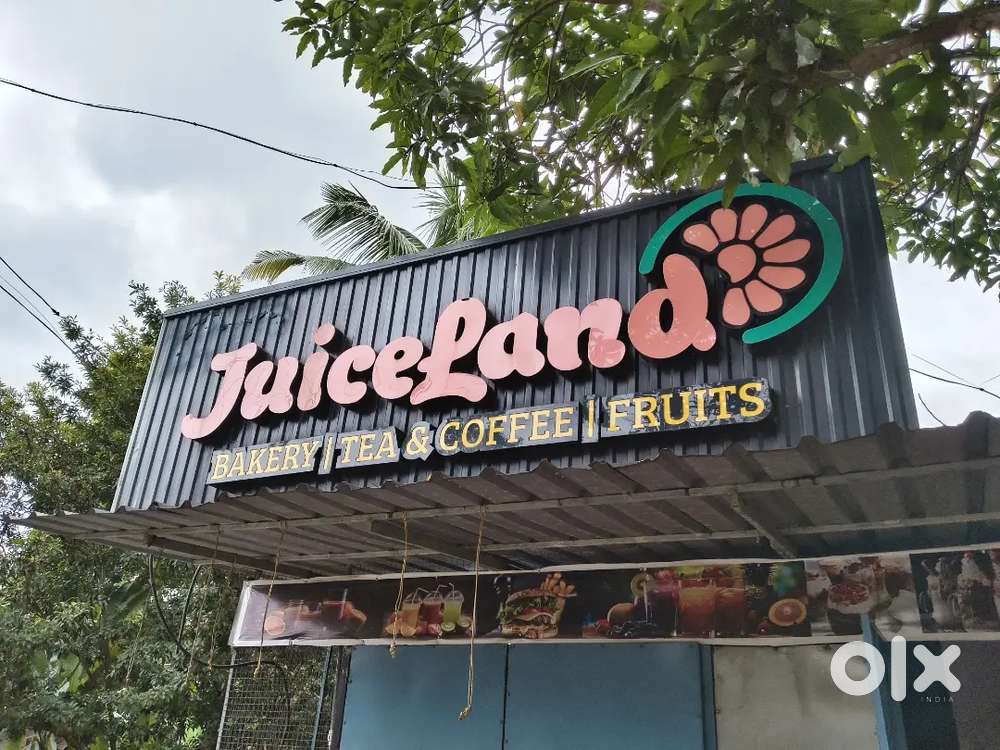 Juice counter, fridge, fruit stand, pups counter